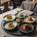 Chef-curated signature tasting menu with elegant small courses beautifully plated