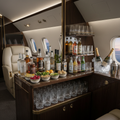 Luxury cabin bar provisioning with premium spirits and wines